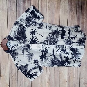 Cactus Man Ricky Singh casual button down.  Masculine Hawaiian print.